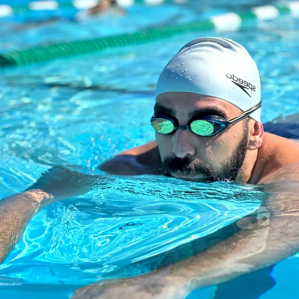 Adult client swimming freestyle after HQSL lessons